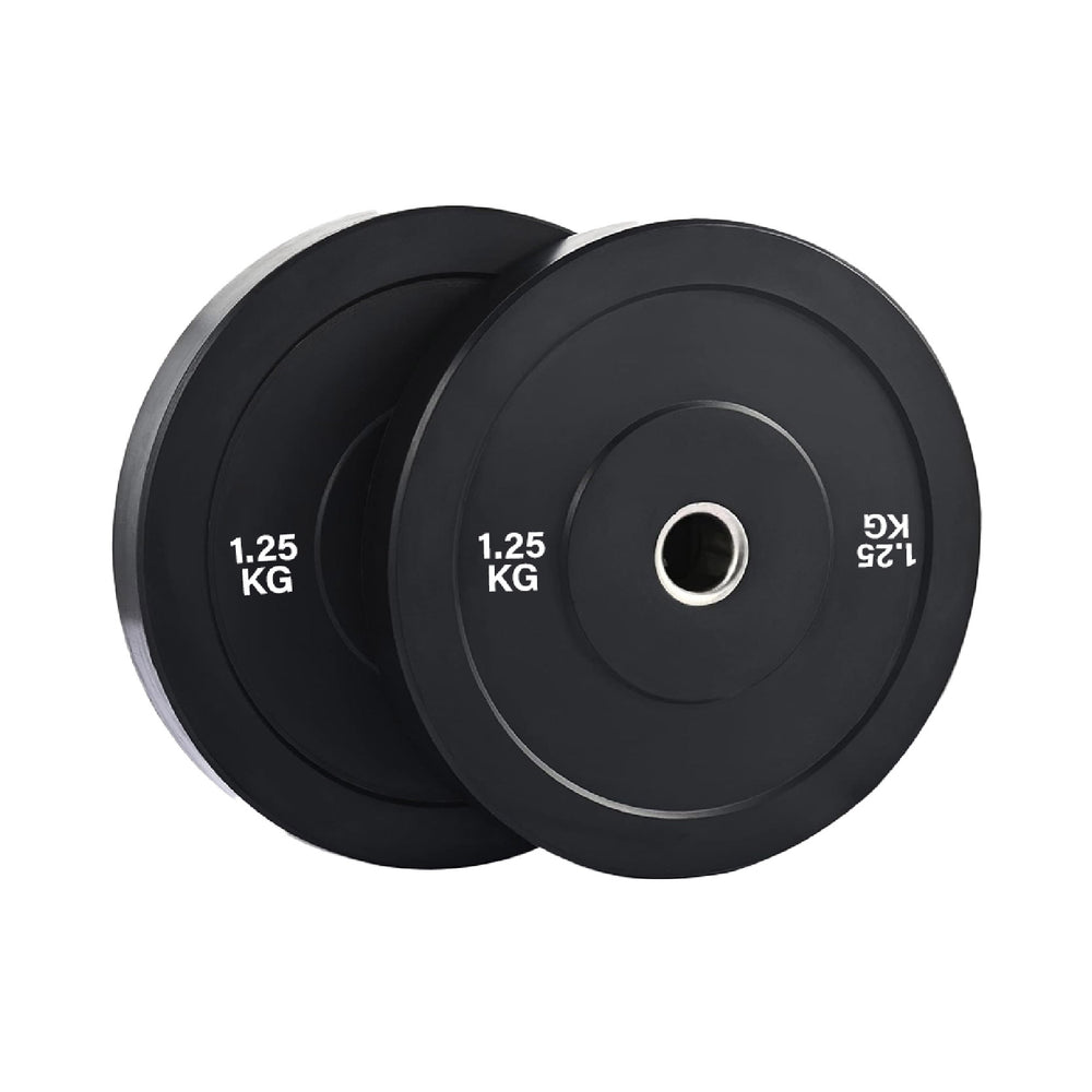 Olympic bumper weight plates set in home gym for strength training, durable rubber plates for safe lifting and deadlifts
